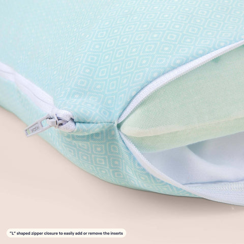 The zipper opening on a Slumber Cloud Adjustable UltraCool Pillow on a cream background