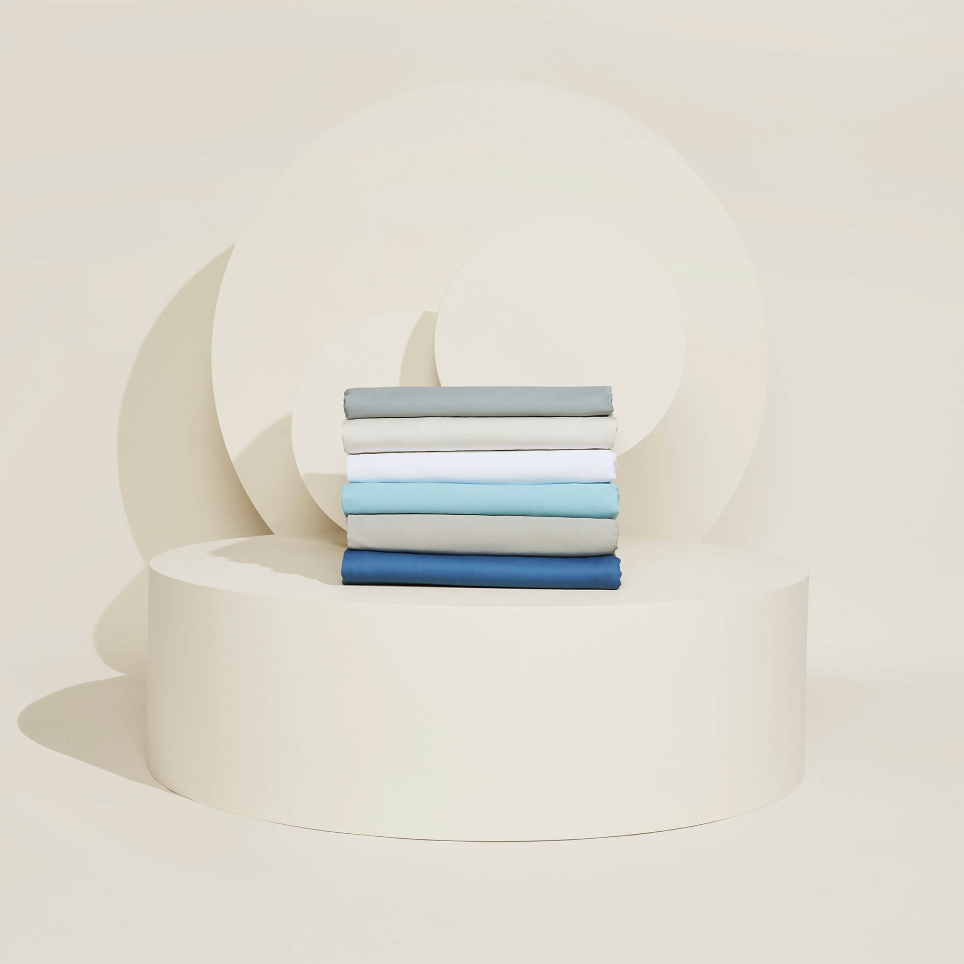 Stacked color options of the Slumber Cloud Essential Duvet Cover with temperature regulation technology