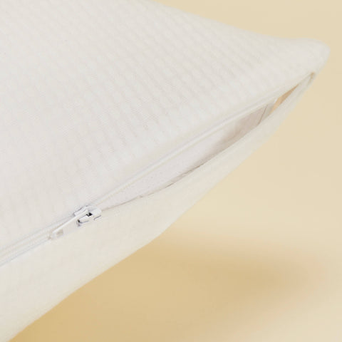 A detailed view of the zipper on the Slumber Cloud Performance Pillow Cover with Outlast temperature regulation technology