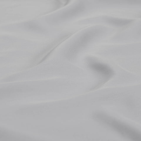 Detailed view of the Slumber Cloud Performance Pillowcase with Outlast temperature regulation technology