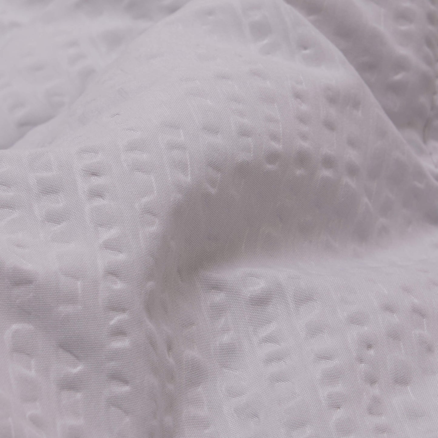 Detailed view of the Slumber Cloud Textured Blanket in pewter made with Outlast Temperature Regulation Technology