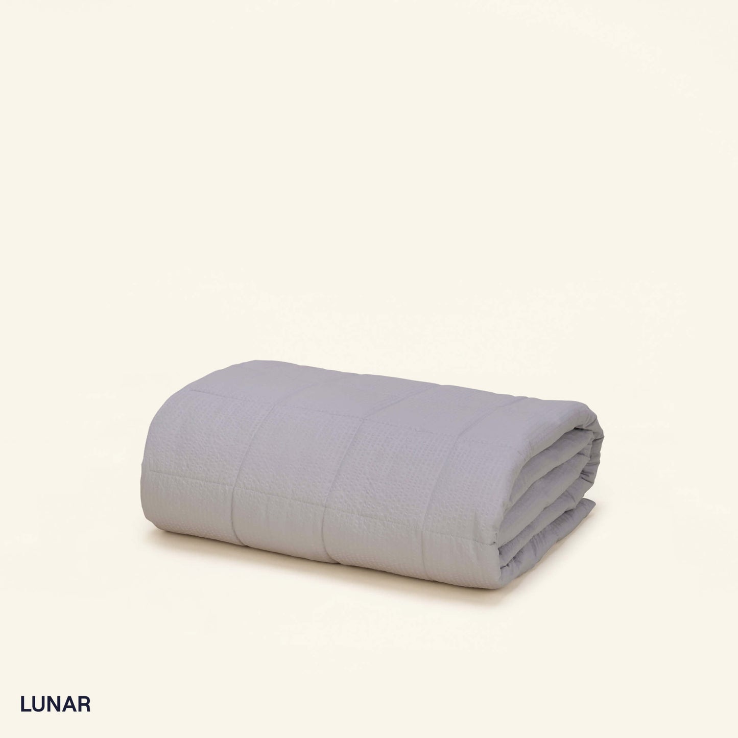 The Slumber Cloud Textured Blanket in Lunar made with Outlast Temperature Regulation Technology
