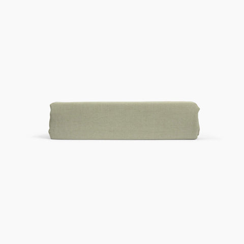 Avec linen classic top sheet in sage folded neatly on a white background