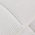 A detailed view of the outer fabric of the Slumber Cloud Performance Mattress Pad