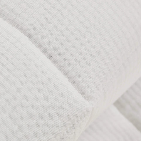 A detailed view of the outer fabric of the Slumber Cloud Performance Mattress Pad