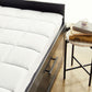Slumber Cloud Core Mattress Pad on a modern bed