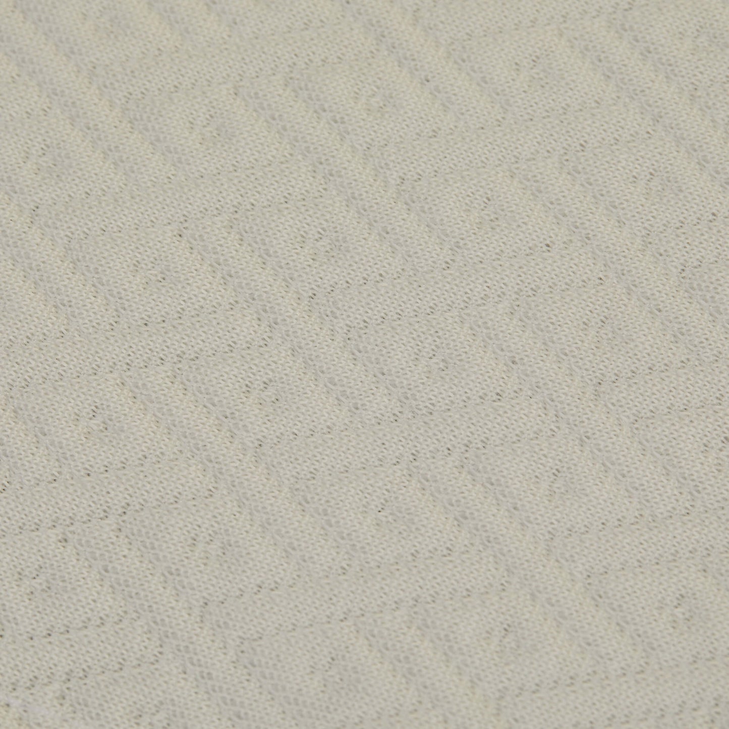 A close up of the fabric details on the Slumber Cloud Core Mattress Protector