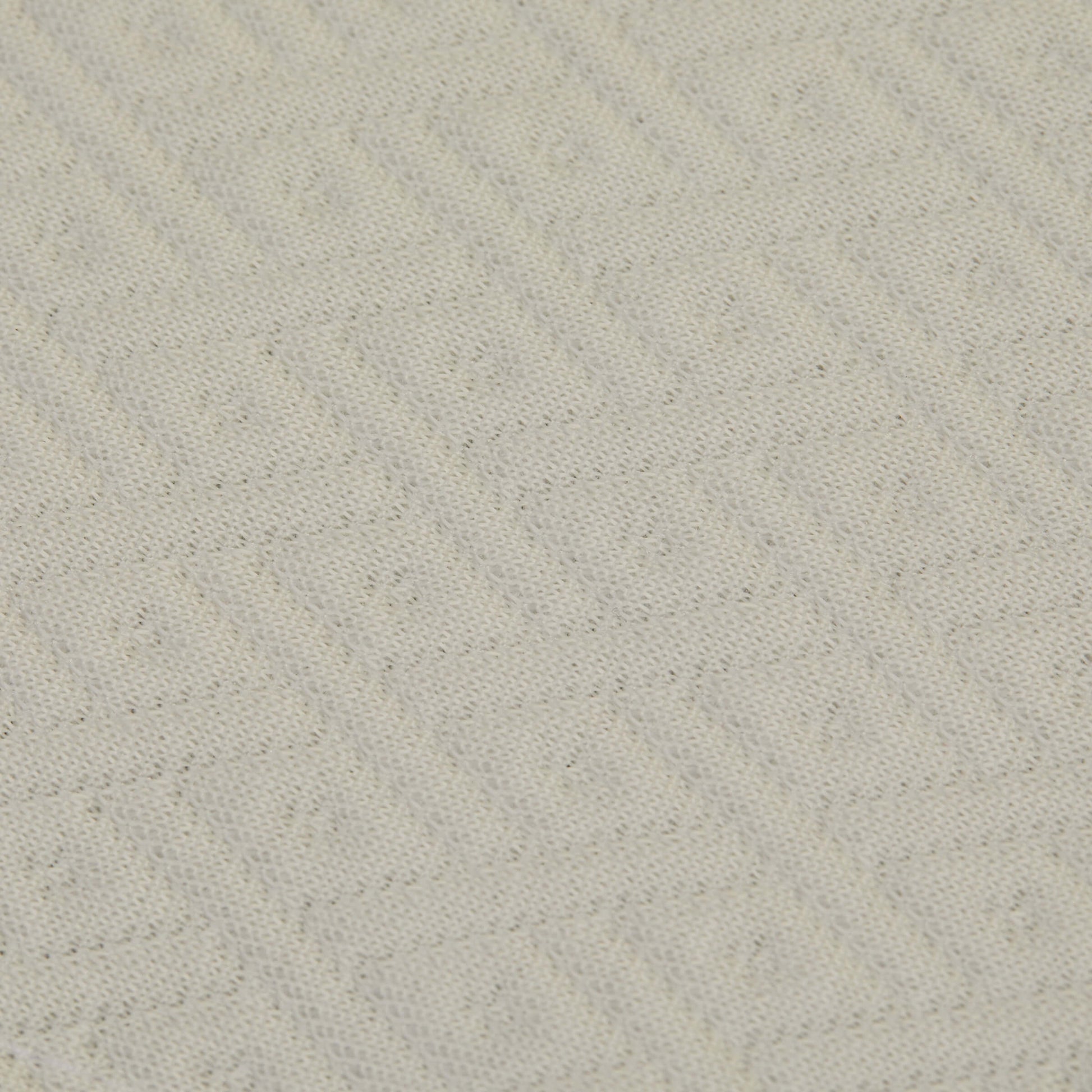 A close up of the fabric details on the Slumber Cloud Core Mattress Protector