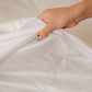 A close up of the fabric details on the Slumber Cloud Core Mattress Protector