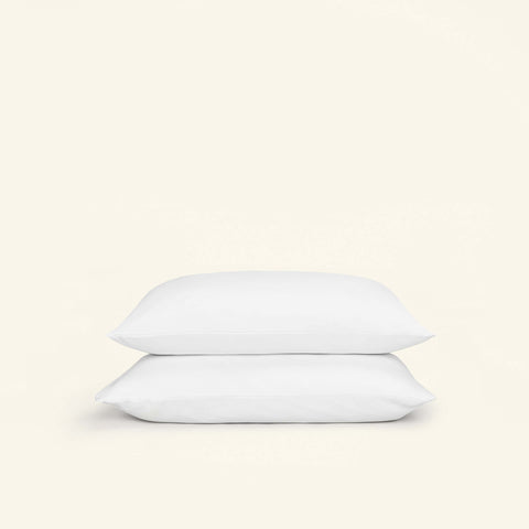 The Slumber Cloud Core Pillow Covers with temperature regulation technology fitted on pillows