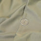 Detailed view of the buttons on the Slumber Cloud Essential Duvet Cover with temperature regulation technology
