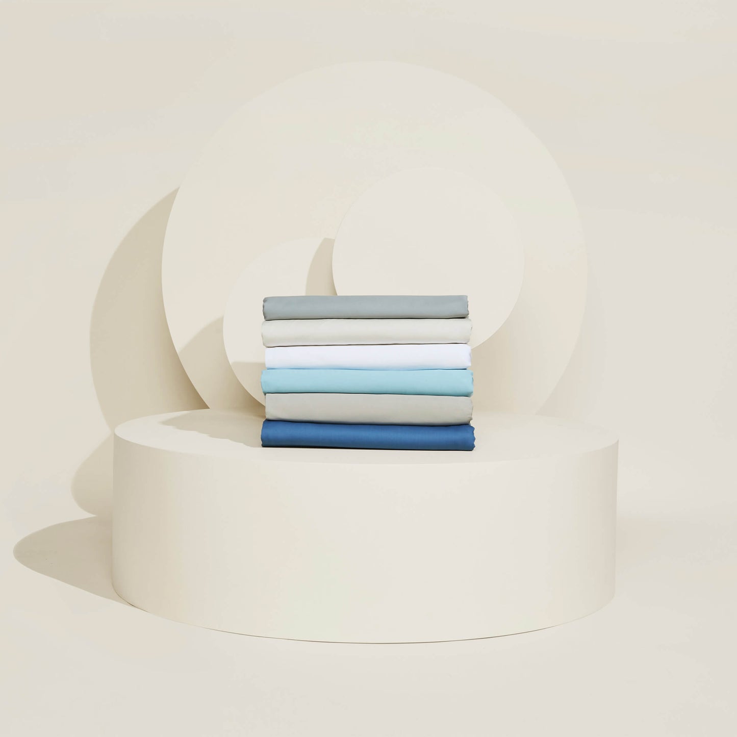 Stacked color options of the Slumber Cloud Essential Duvet Cover with temperature regulation technology