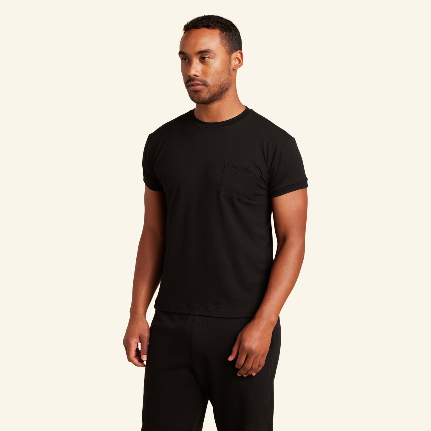 Man wearing the Slumber Cloud Essential Pocket Tee made with Outlast temperature regulation technology