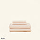 The Slumber Cloud Essential Sheet Set made with temperature regulation technology in blush