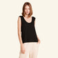 Woman wearing the Slumber Cloud Essential Tank made with Outlast temperature regulation technology