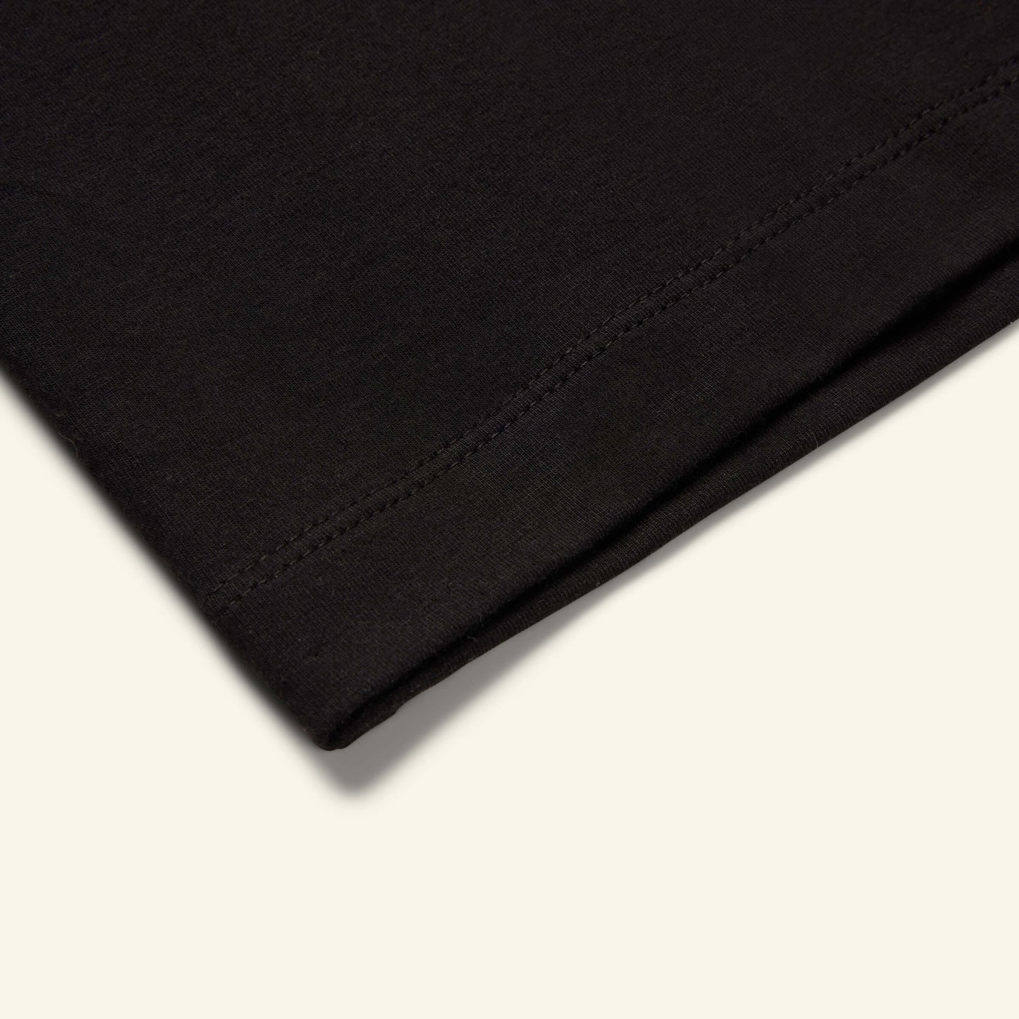 Detailed view of the Slumber Cloud Essential V-Neck made with Outlast temperature regulation technology