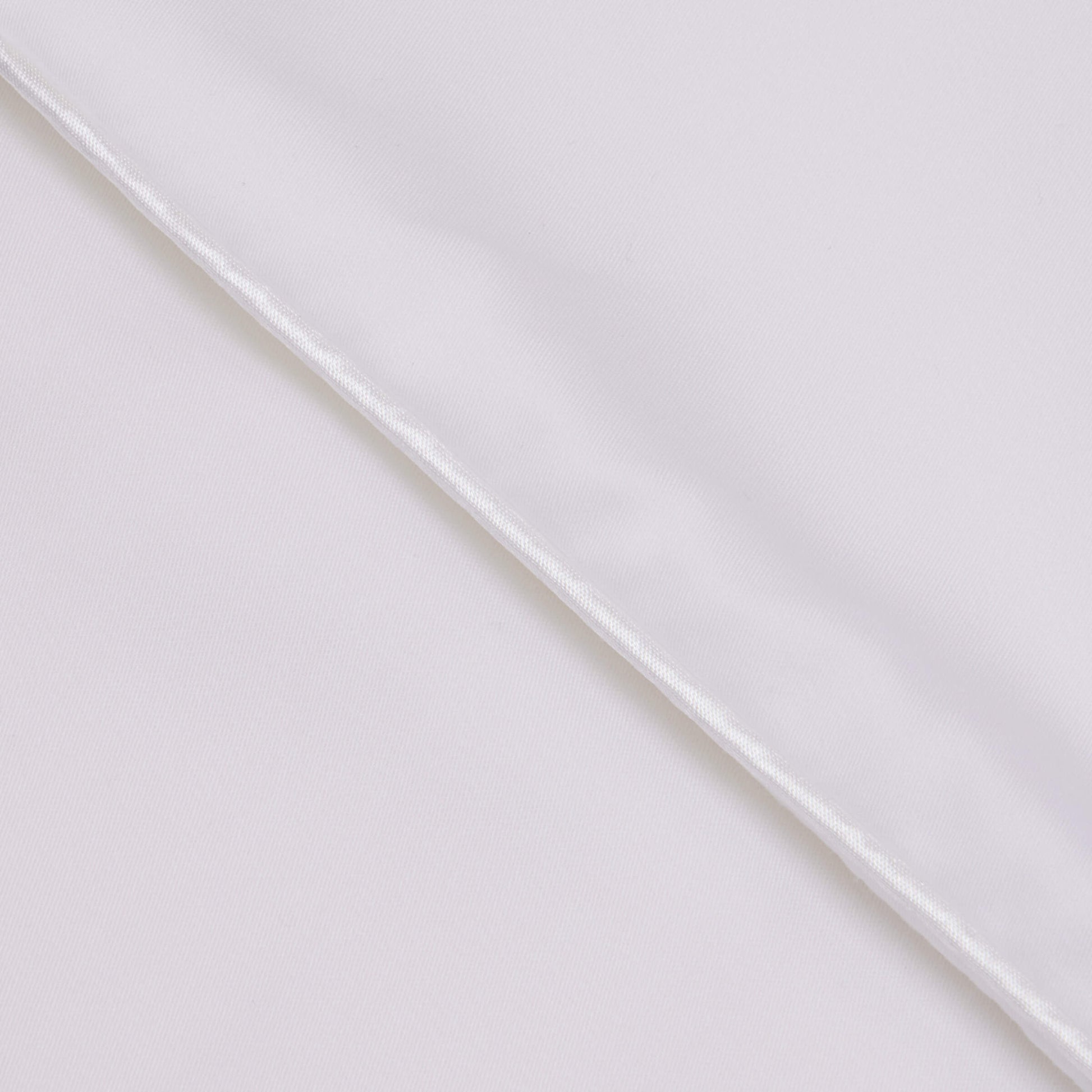 Detailed view of the fabric piping on the Slumber Cloud Performance Duvet Cover with temperature regulation technology and Tencel