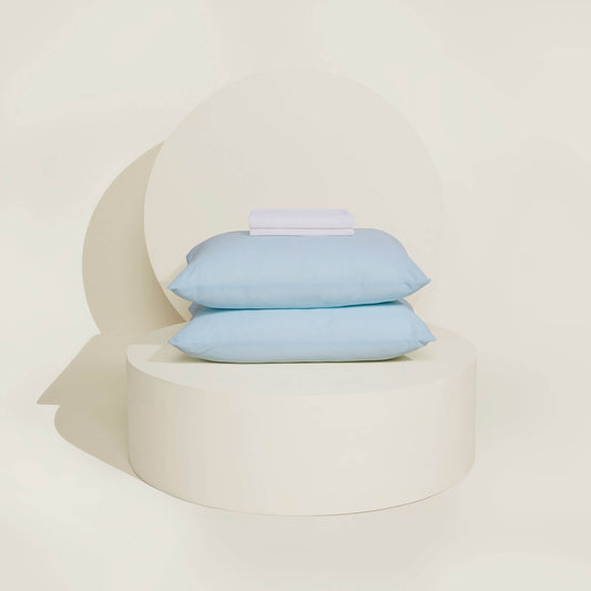The Slumber Cloud Performance Pillow Bundle, consisting of two UltraCool Pillows and a set of Performance Pillow Covers with Outlast® temperature regulation technology to help keep you cool and comfortable throughout the night
