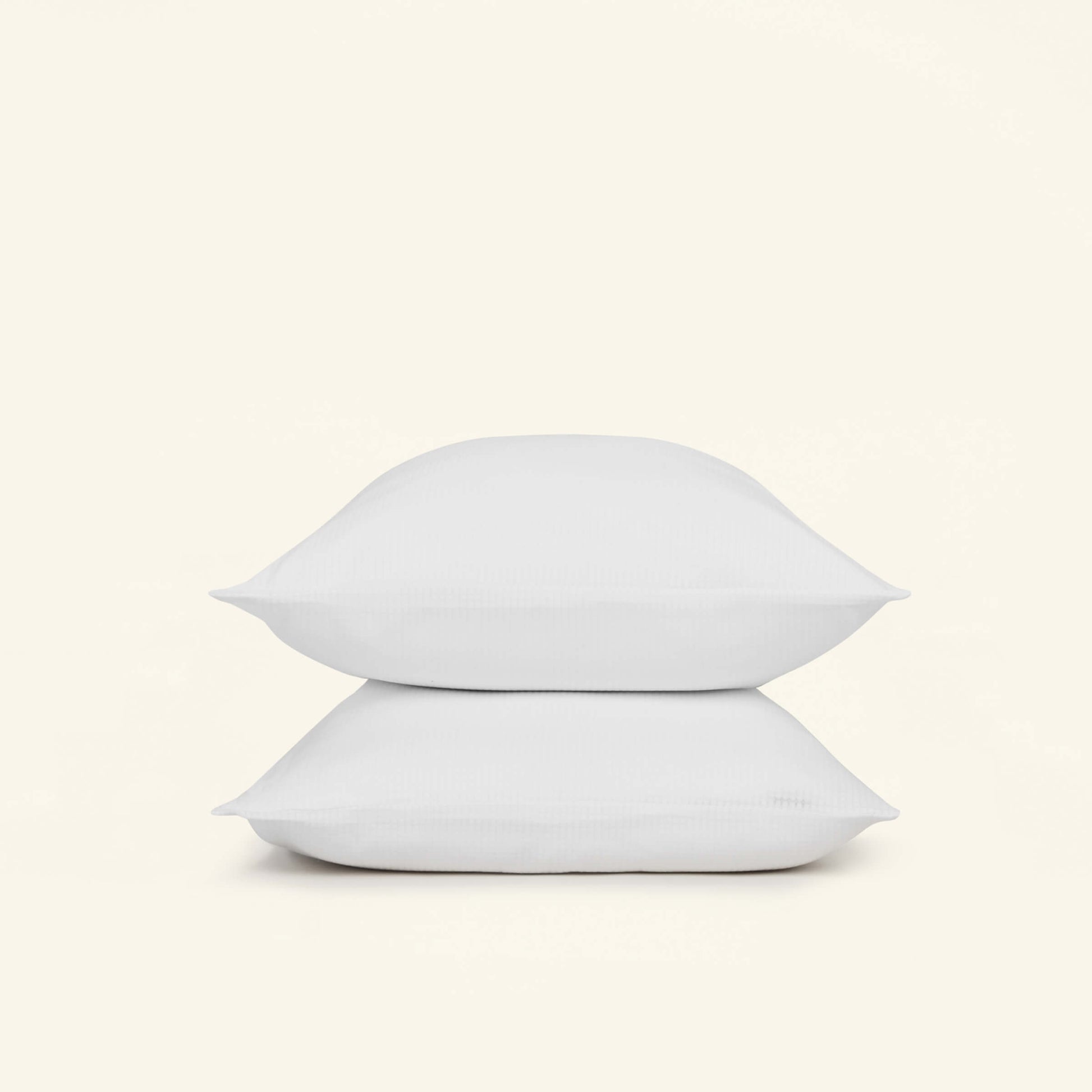 The Slumber Cloud Performance Pillow Cover made with Outlast temperature regulation technology and Tencel to help you stay cool through the night. 
