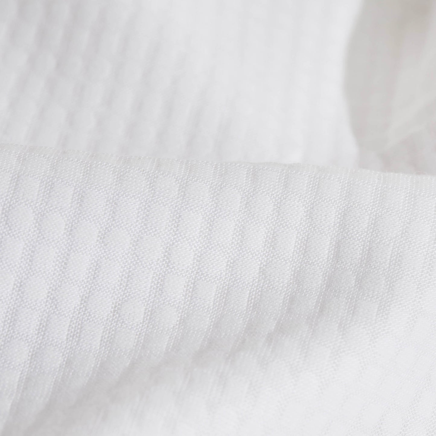 A detailed view of the fabric on the Slumber Cloud Performance Pillow Cover with Outlast temperature regulation technology