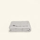 The Slumber Cloud Plush Throw Blanket made with Outlast Temperature regulation technology