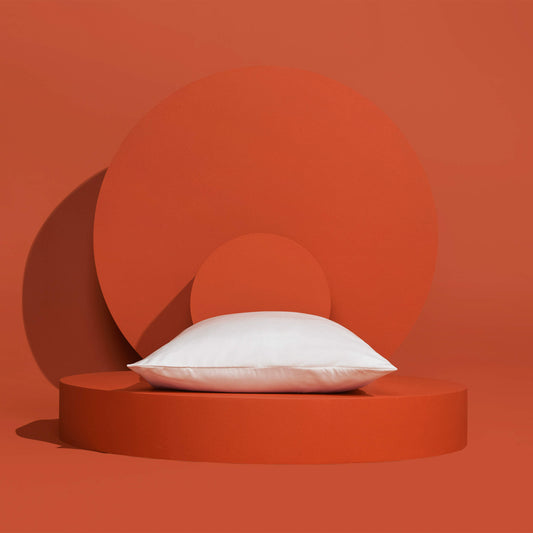 The Slumber Cloud Silk Pillowcase with Outlast® temperature regulation technology to help keep you cool and comfortable throughout the night