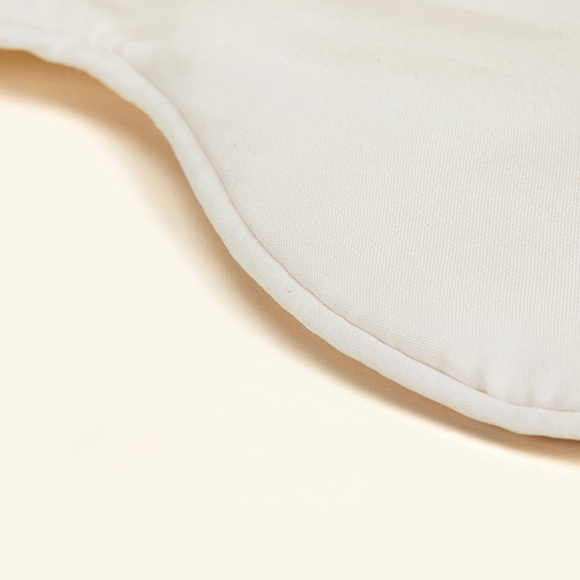 A close up of the Slumber Cloud 100% Silk Sleep Mask made with Outlast temperature regulation technology
