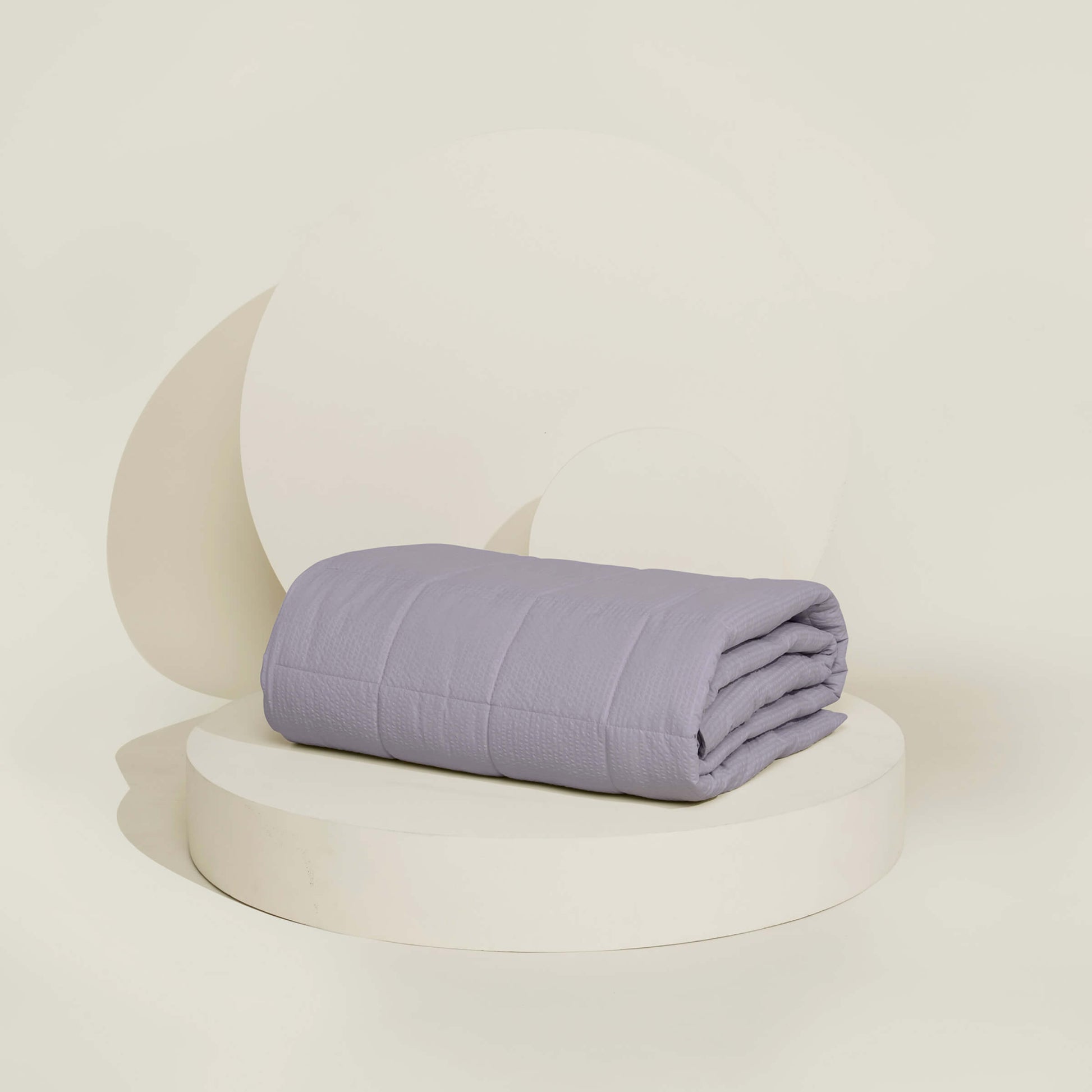 The Slumber Cloud Textured Blanket in Lunar with Outlast® temperature regulation technology to help keep you cool and comfortable throughout the night
